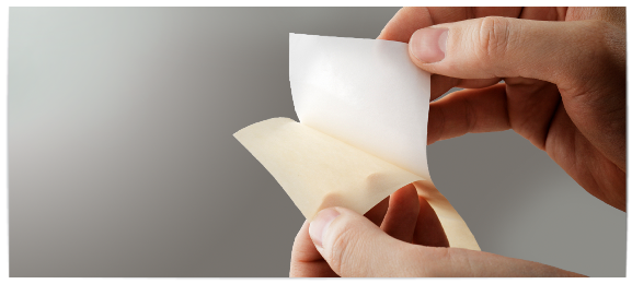 Adhesive vinyl peeling off backer