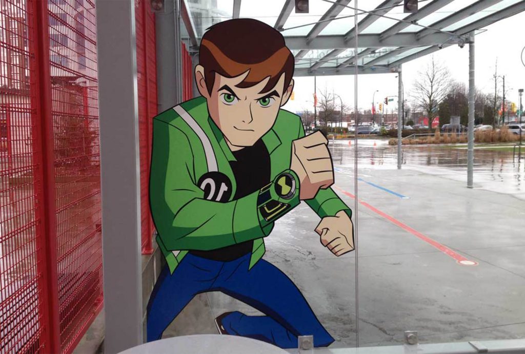 Adhesive window decal of cartoon character at bus stop