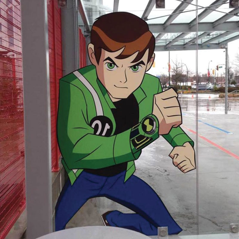 Adhesive window decal of cartoon character at bus stop