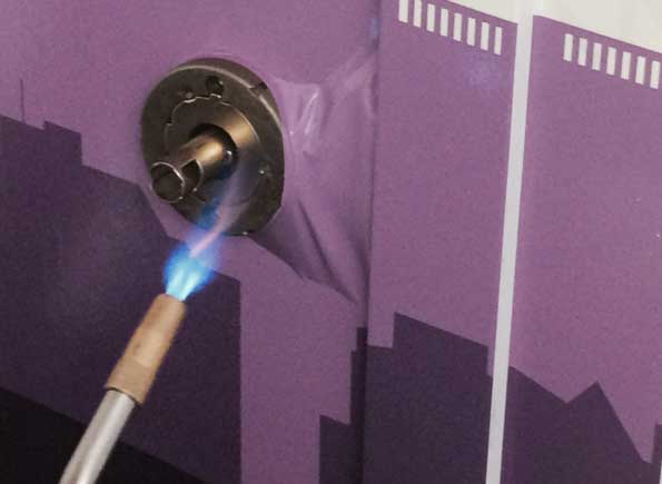 Applying heat to vinyl during installation